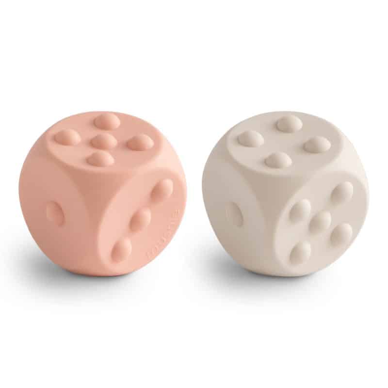 Mushie dice press toy roze wit